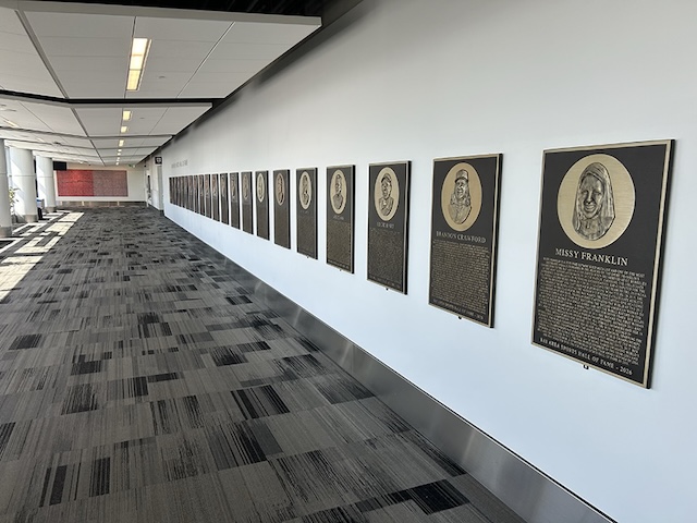 Bay Area Sports Hall of Fame plaque display along the airport hallway